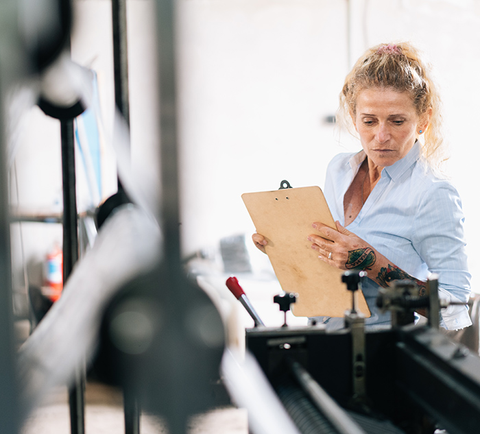 Entrepreneur working in plastic recycling factory