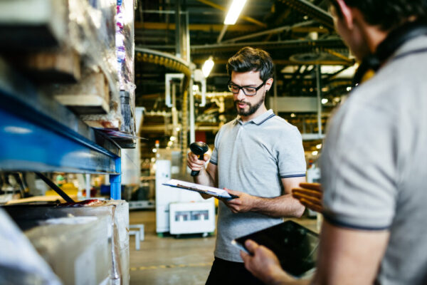 Manual Worker With Bar Code Reader And Digital Tablet