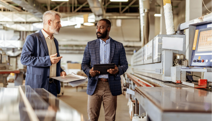two manufacturers walking on the shopfloor